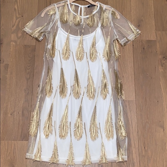 Banjul Sheer feather dress white slip underneath - Picture 2 of 3